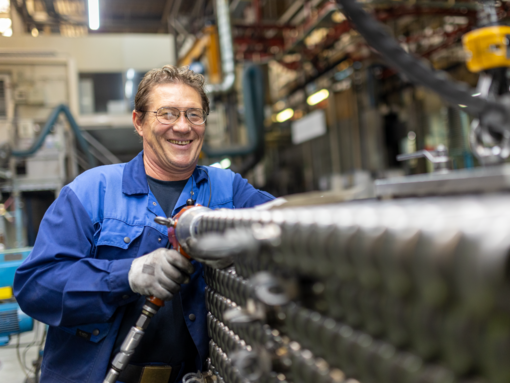 Zehnder employee working man at zehnder production hall